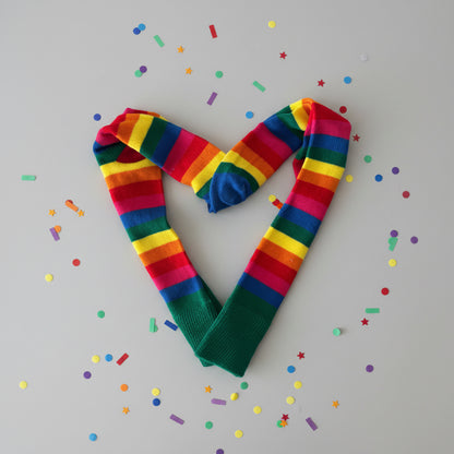 Multicolored striped socks on a reflective surface